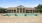 a large house with a pool in front of it