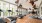 a room with exercise equipment and a large window