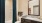 a bathroom with a sink toilet and a mirror