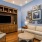 a living room with a tv and couches