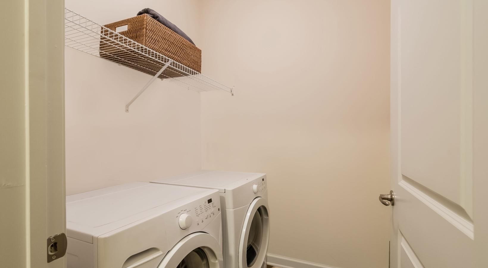 Everything you need right at your fingertips a laundry basket on a dryer