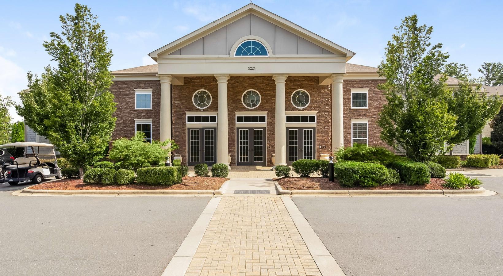 Find your perfect fit at Alexander Village a building with a parking lot