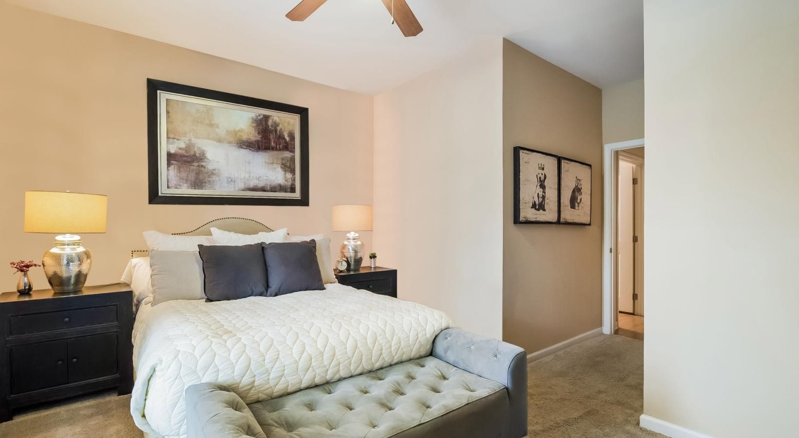 Beautiful bedrooms to fit every need a bedroom with a bed and lamps