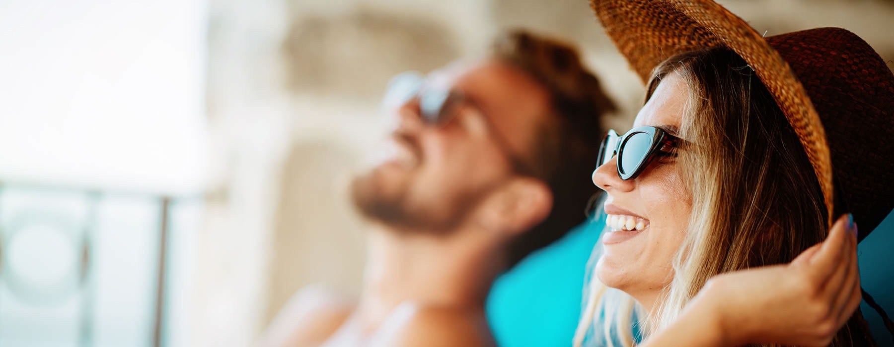 a man and woman looking at a book