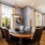 a dining room with a chandelier and a table
