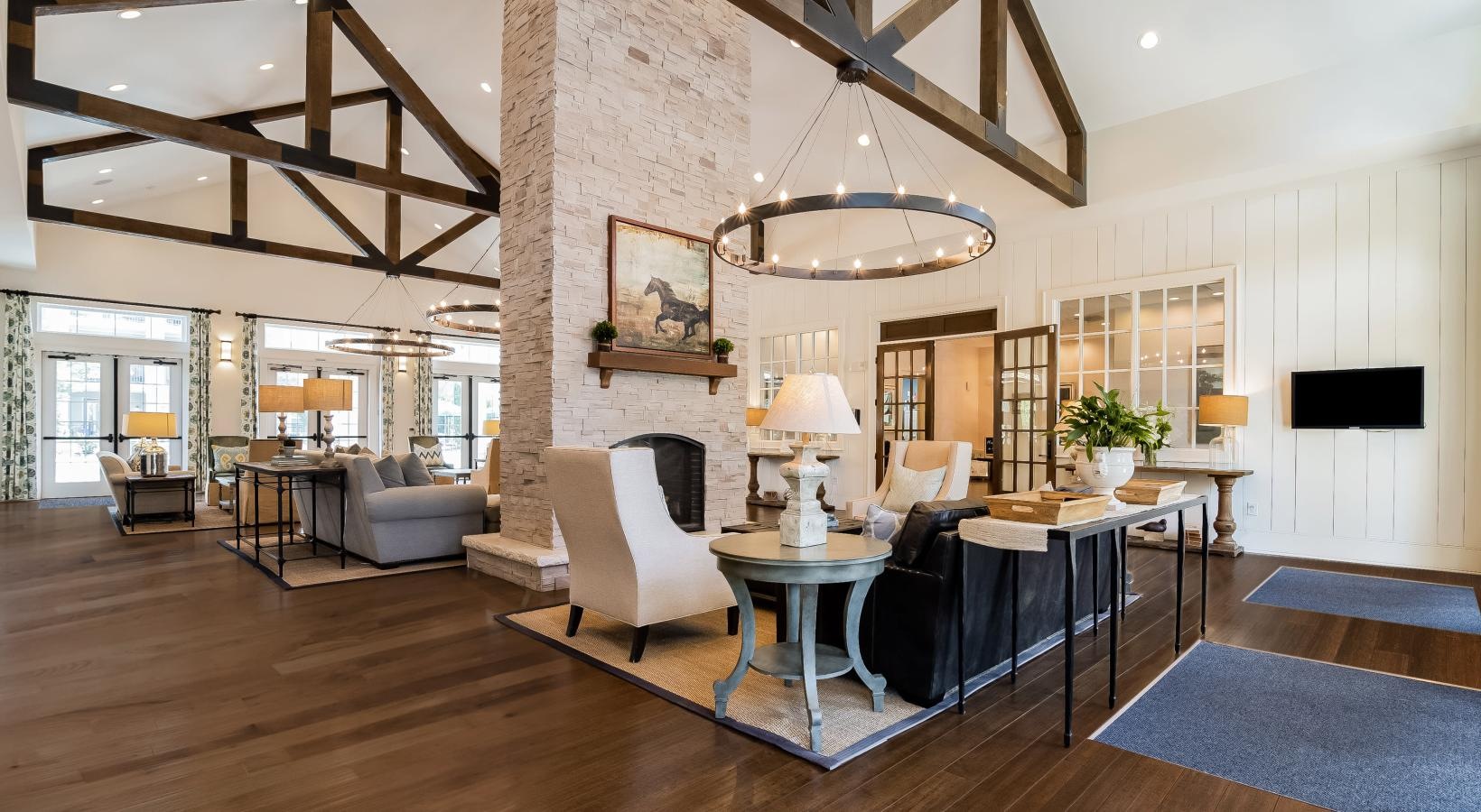 Find your perfect fit at Alexander Village a living room with a wood floor