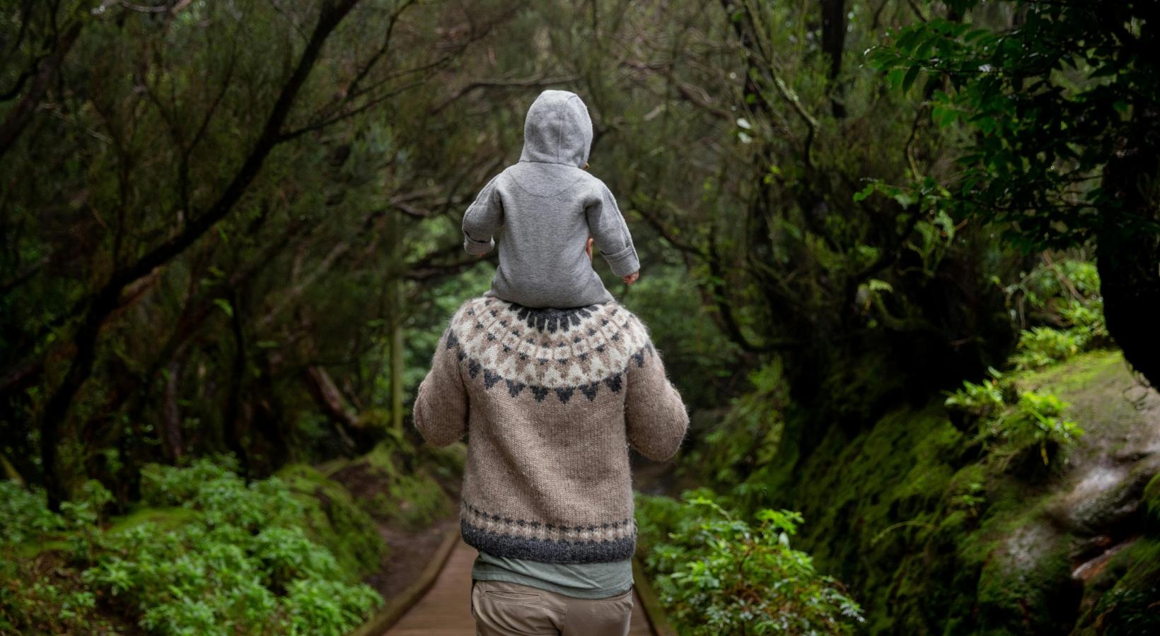 A beautiful community at the heart of all your passions a person walking on a path in a forest