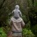 a person walking on a path in a forest