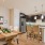 a kitchen with a dining table